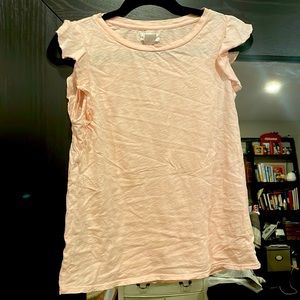 Pink flutter-sleeve blouse from Anthropologie